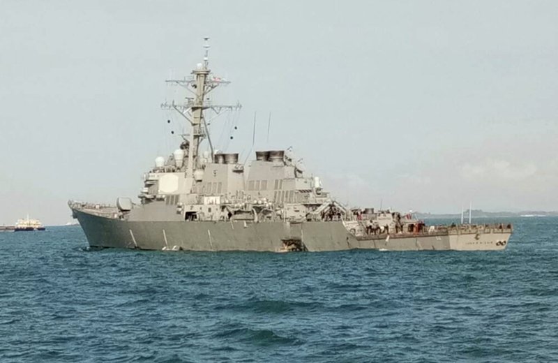 10 sailors missing in collision between US warship, tanker