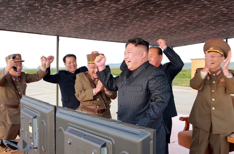 Defiant N. Korea leader says he will complete nuke program