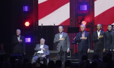 Former presidents call for unity at hurricane aid concert