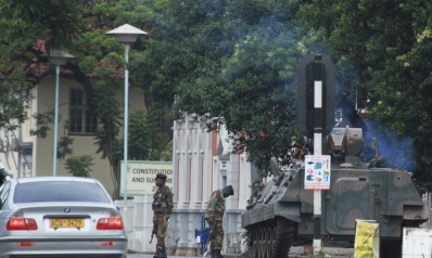 Zimbabwe army has Mugabe, wife in custody, controls capital
