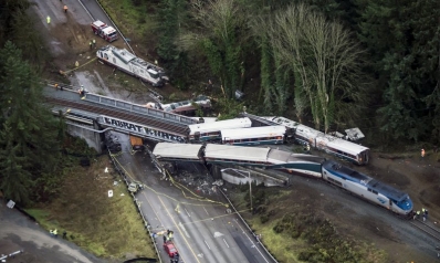 Amtrak train on new route hurtles onto highway, kills 3