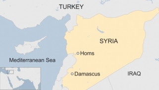 Syria conflict: Strikes hit Syrian airfield, state media report