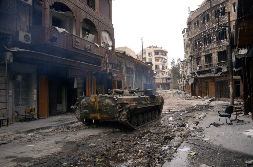 A military vehicle belonging to Syrian army loyal to President Bashar al-Assad is seen in Khan al-Wazir district near the castle of  Aleppo January 12, 2013.  REUTERS/George Ourfalian      (SYRIA - Tags: CIVIL UNREST POLITICS MILITARY)