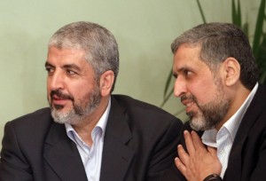 Hamas leader Khaled Meshaal (L) and Islamic Jihad leader Ramadan Shallah attend a meeting of the leadership framework for the Palestinian factions in downtown Cairo on December 22, 2011.  The leaders are examining the possibility of setting up a new PLO leadership body which would be "the first concrete application of the Cairo agreement, of the reconciliation and of the partnership between all the political forces".
AFP PHOTO/MOHAMMED ABED