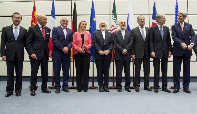 From left to right: Chinese Foreign Minister Wang Yi, French Foreign Minister Laurent Fabius, German Foreign Minister Frank-Walter Steinmeier, European Union High Representative Federica Mogherini, Iranian Foreign Minister Mohammad Javad Zarif, Head of the Iranian Atomic Energy Organization Ali Akbar Salehi, Russian Foreign Minister Sergey Lavrov, British Foreign Secretary Philip Hammond and US Secretary of State John Kerry pose for a group picture at the United Nations building in Vienna, Austria, Tuesday, July 14, 2015, during their talks on the Iranian nuclear program. (Joe Klamar/Pool Photo via AP)