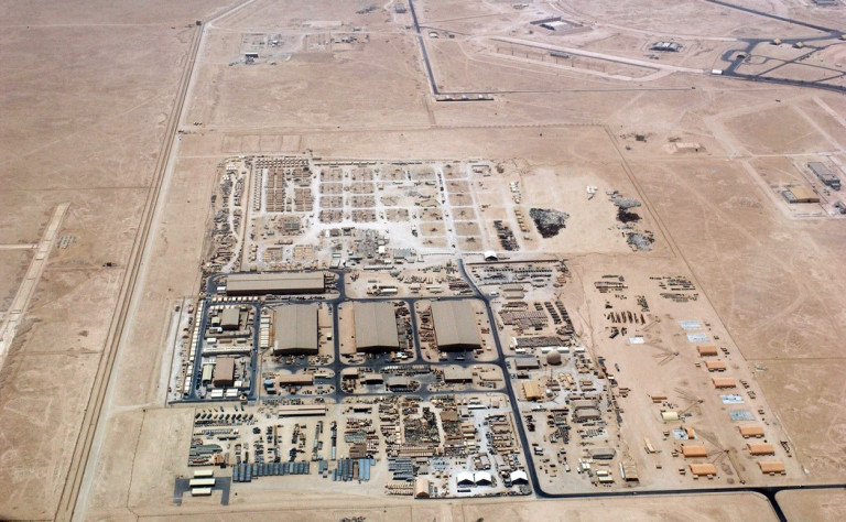 An aerial overhead view of "Ops Town" at at Al Udeid Air Base (AB), Al Rayyan Province, Qatar (QAT), taken from a US Air Force (USAF) KC-135 Stratotanker during Operation IRAQI FREEDOM.