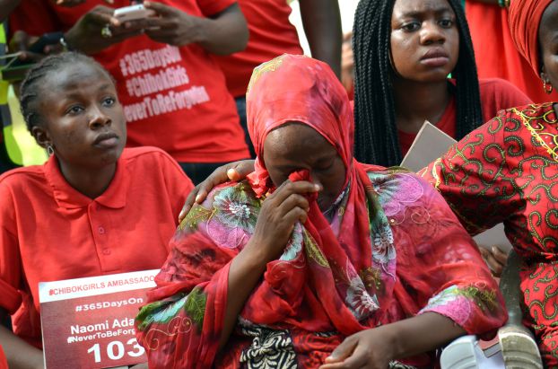 Relatives weep at a rally marking 500 days since the abductions of Chibok schoolgirls by Boko Haram militants during a rally to press for their release in Abuja, on August 27, 2015.  Relatives of over 200 Nigerian schoolgirls kidnapped by Boko Haram militants marked 500 days since the abductions, with hope dwindling for their rescue despite a renewed push to end the insurgency. AFP PHOTO/STRINGER        (Photo credit should read -/AFP/Getty Images)