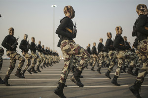 FILE - In this Thursday, Sept. 17, 2015 file photo, Saudi security forces take part in a military parade in preparation for the annual Hajj pilgrimage in Mecca, Saudi Arabia. Saudi Arabia said Tuesday, Dec. 15, 2015 that 34 nations have agreed to form a new "Islamic military alliance" to fight terrorism with a joint operations center based in the kingdom's capital, Riyadh.(AP Photo/Mosa'ab Elshamy, File)