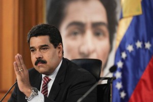 03 Dec 2014, Caracas, Venezuela --- (141203) -- CARACAS, Dec. 3, 2014 (Xinhua) -- Image provided by Venezuela's Presidency shows Venezuelan President Nicolas Maduro taking part in a press conference in Caracas, Venezuela, on Dec. 2, 2014. Maduro announced on Tuesday a cut of 20 percent in the lavish spending contemplated inside the State budget for 2015, as a result of the decline in oil prices. (Xinhua/Venezuela's Presidency) (azp)***NO SALES-NO ARCHIVE*** ***EDITORIAL USE ONLY*** --- Image by © VENEZUELA'S PRESIDENCY/Xinhua Press/Corbis