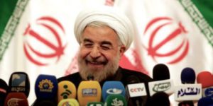 xSourire-nouveau-pr-sident-iranien-Hassan-Rohani-en-juin-2013.jpg.pagespeed.ic.9qkP5aYPHK