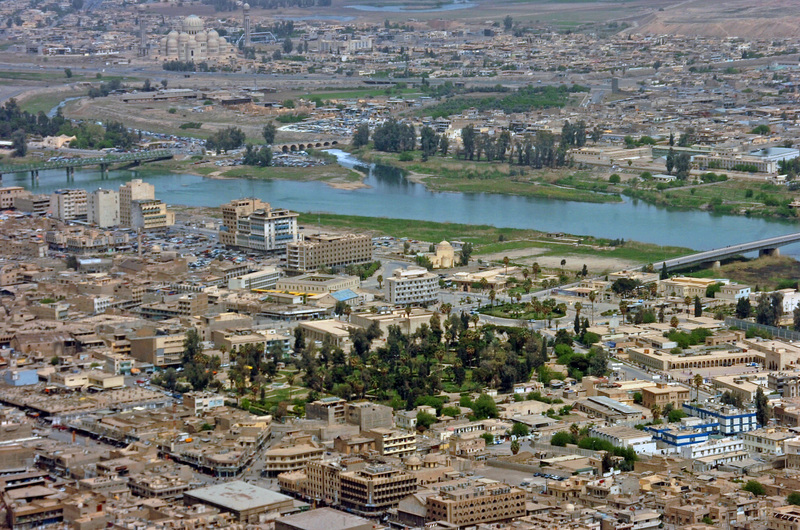 Downtown Mosul, Iraq, is seen from the left seat of a OH-58 Kiowa helicopter April 5. The Kiowa is from 4th Squadron, 6th Air Cavalry Regiment from Fort Lewis, Wash. Helicopters are used to provide extra security to troops on the ground in the Mosul area.