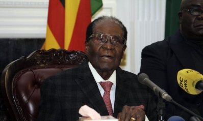 Zimbabwe president defies mounting pressure to leave office