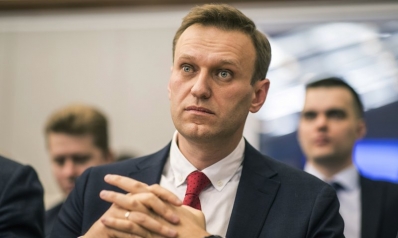 Russian officials bar Navalny from running for president