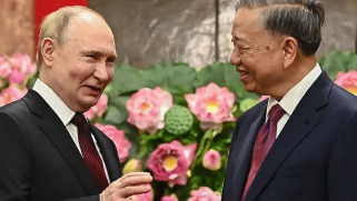 Putin vows deeper ties with Vietnam in visit criticised by US