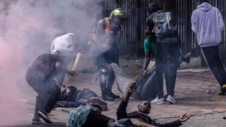 Kenyan police open fire on protesters as crowd tries to storm parliament