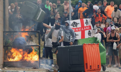 Rioters try to torch Rotherham asylum seeker hotel amid far-right violence