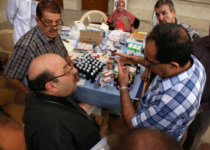 العراق يتعامل مع القمة الظاهرة من جبل فساد الأدوية