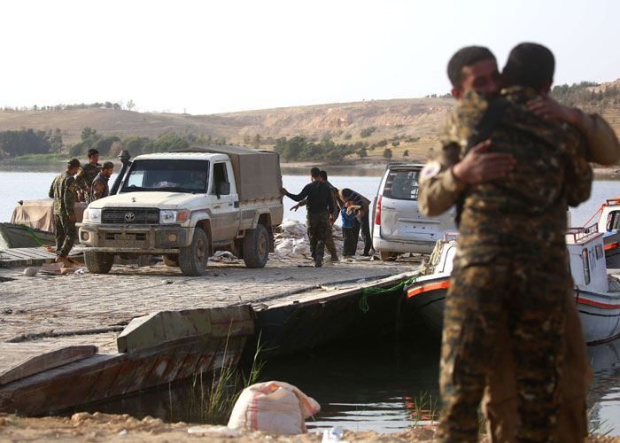 الأكراد يتقدمون في الرقة بعد ضمانات أميركية