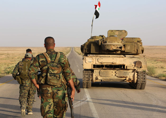 قوات سورية تتحرك شرقا لتأمين طريق إيران عبر العراق