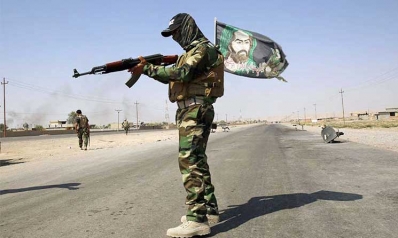 العبادي يساوي بين الحشد الشعبي والجيش العراقي في الحقوق والرواتب العبادي يساوي بين الحشد الشعبي والجيش العراقي في الحقوق والرواتب