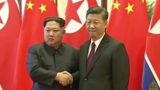 زعيم كوريا الشمالية يتعهد من بكين بنزع السلاح النووي