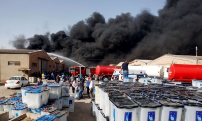 بغداد الحرائق: النيران تلتهم مخازن صناديق الاقتراع استباقا للفرز اليدوي