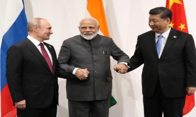 تحالف روسي صيني هندي يسعى لتقويض إمبراطورية المال الأميركية