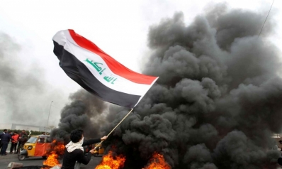 احتجاجات العراق تتصاعد.. قطع طرق وإغلاق دوائر حكومية