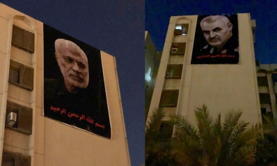 صور قاسم سليماني وأبو مهدي المهندس مقابل السفارة الأمريكية