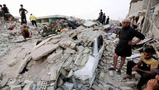 مخازن سلاح الميليشيات تبقي سكان المدن العراقية على حافة الجحيم اللبناني