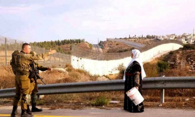 عشرون عاما على الجدار الذي شكل حياة الفلسطينيين
