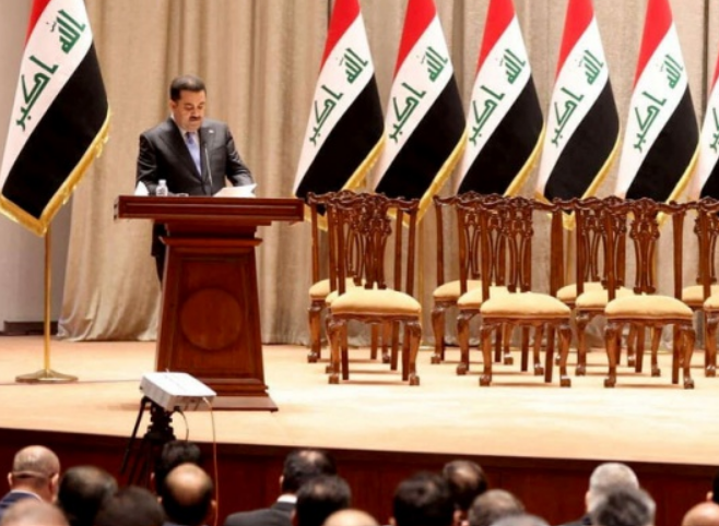 A new government in Iraq after more than a year of political crisis