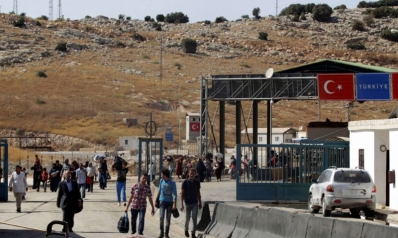 لاجئون سوريون يعودون من تركيا إلى بلدهم بعد الزلزال