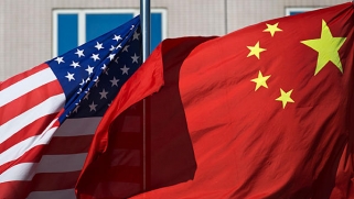 الوكالة الدولية بين الأهداف الأمريكية والغايات الصينية