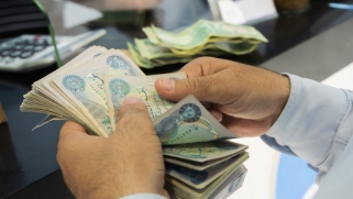 إقصاء الدولار من التعاملات التجارية في العراق بحلول 2024