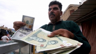 مصارف تعمل بواجهات عراقية وتقدم خدمات مالية كبيرة لإيران