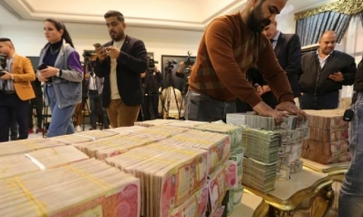 تعافي الدينار العراقي أمام الدولار وسط إجراءات حكومية لمواجهة المضاربين
