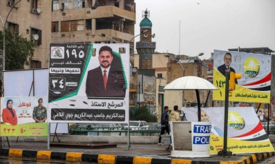 ناخبون في المناطق السنية العراقية يصوتون تحت تهديد سلاح الميليشيات الشيعية